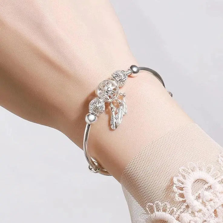 Adjustable bracelet with clover-shaped charm made of sterling silver 925