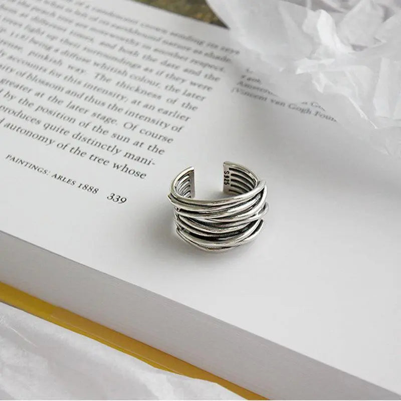 Adjustable silver ring