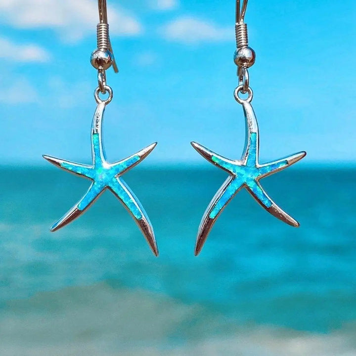 Starfish-shaped earrings in opal and silver