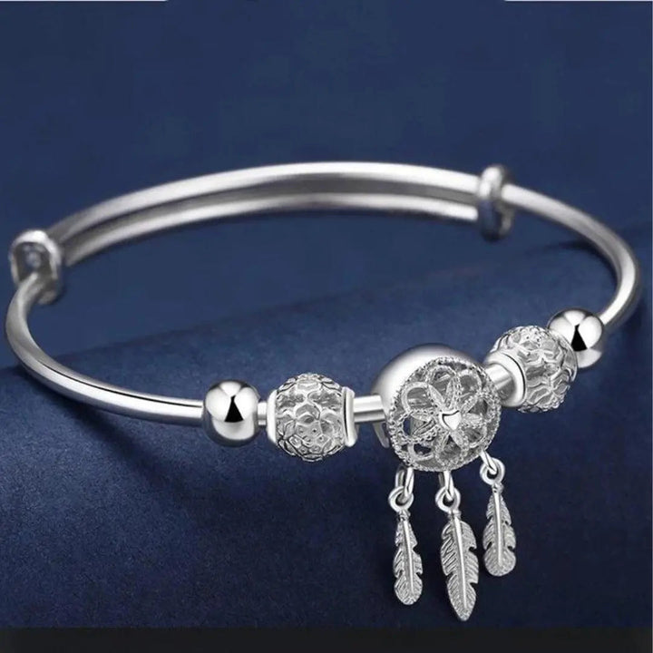Adjustable bracelet with clover-shaped charm made of sterling silver 925