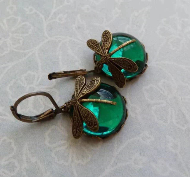 Dragonfly-shaped earrings in antique gold