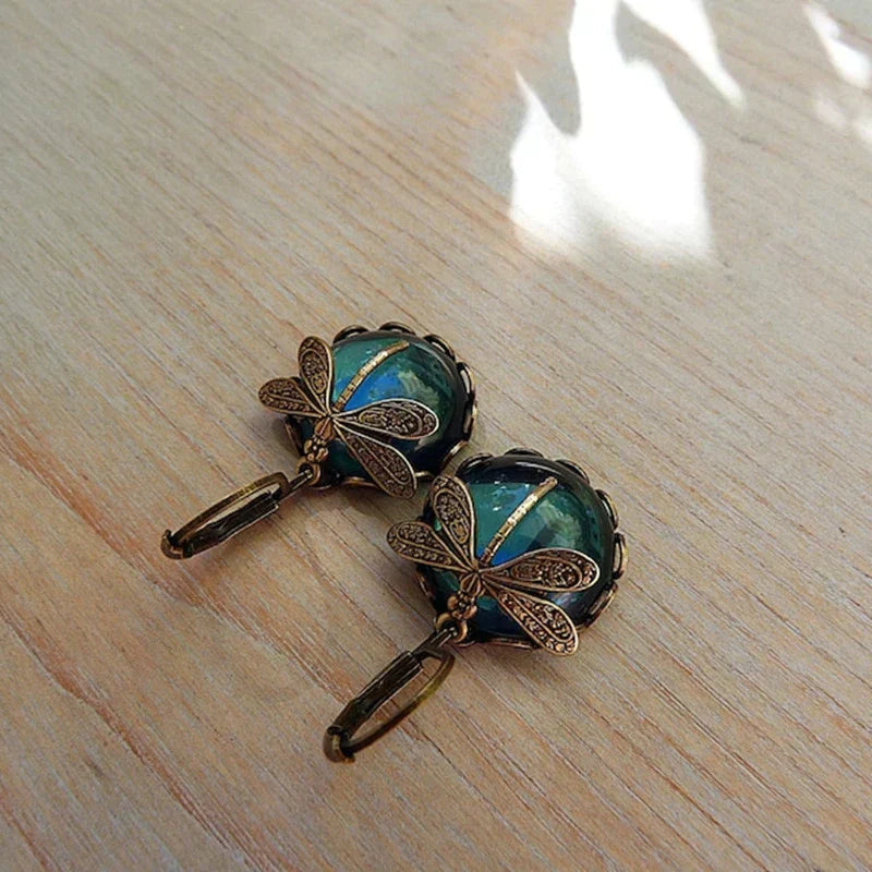 Dragonfly-shaped earrings in antique gold