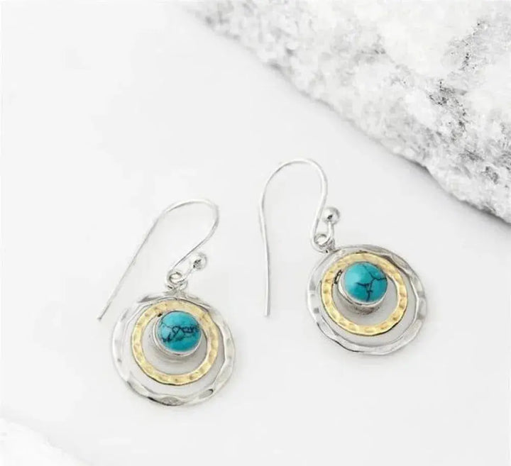 Boho Saturn earrings with turquoise stone in silver and gold